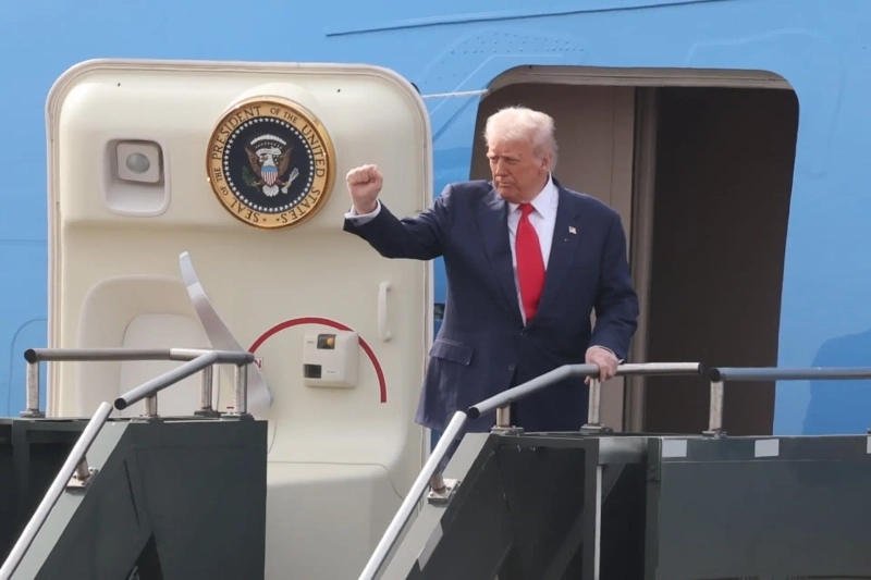 President Trump is seen greeting as he boards Air Force One.