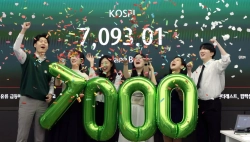 Kospi Surges Past 7,300 After First Break Above 7,000; Samsung Electronics Jumps 14%